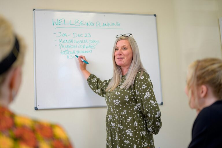 Older workers participating in a group activity