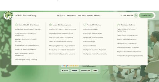 Holistic Services Group website homepage showing four workplace wellbeing service areas.